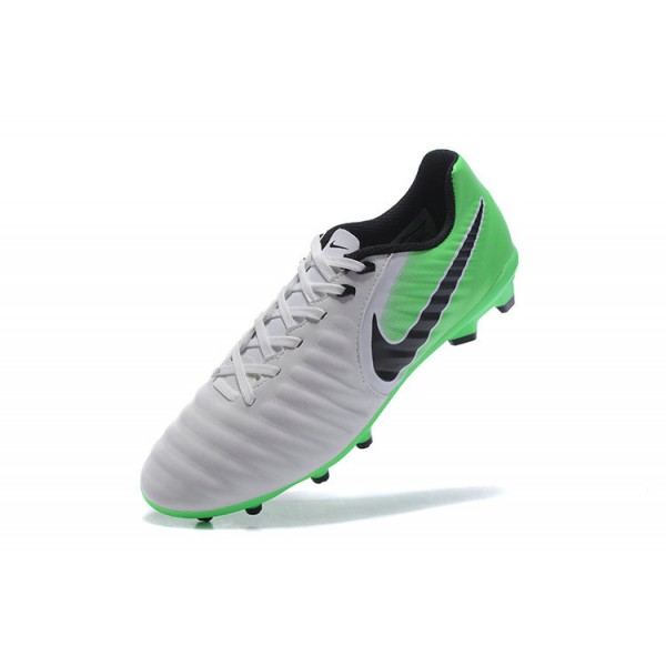 green and white soccer cleats